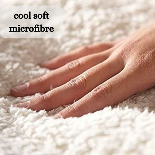 Hand touching soft microfiber fabric.